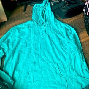 A blue hoodie, never worn.